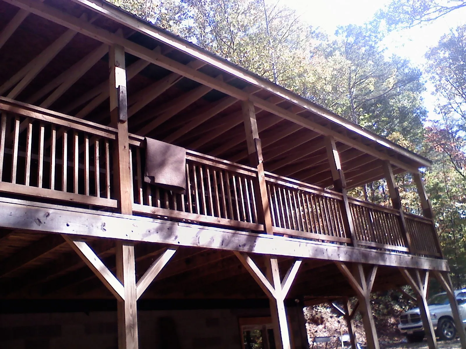 Timber framing under a new elevated porch and deck — Roof Leak Repair in Wilton by Roofing Brothers